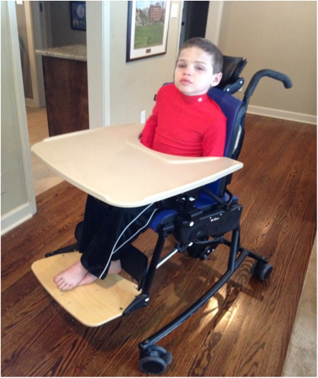 Cooper in his new Rifton Chair